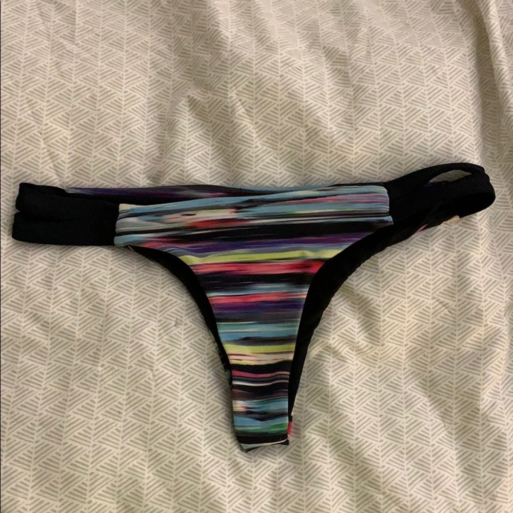 Reversible Hurley bikini bottoms. Size small.